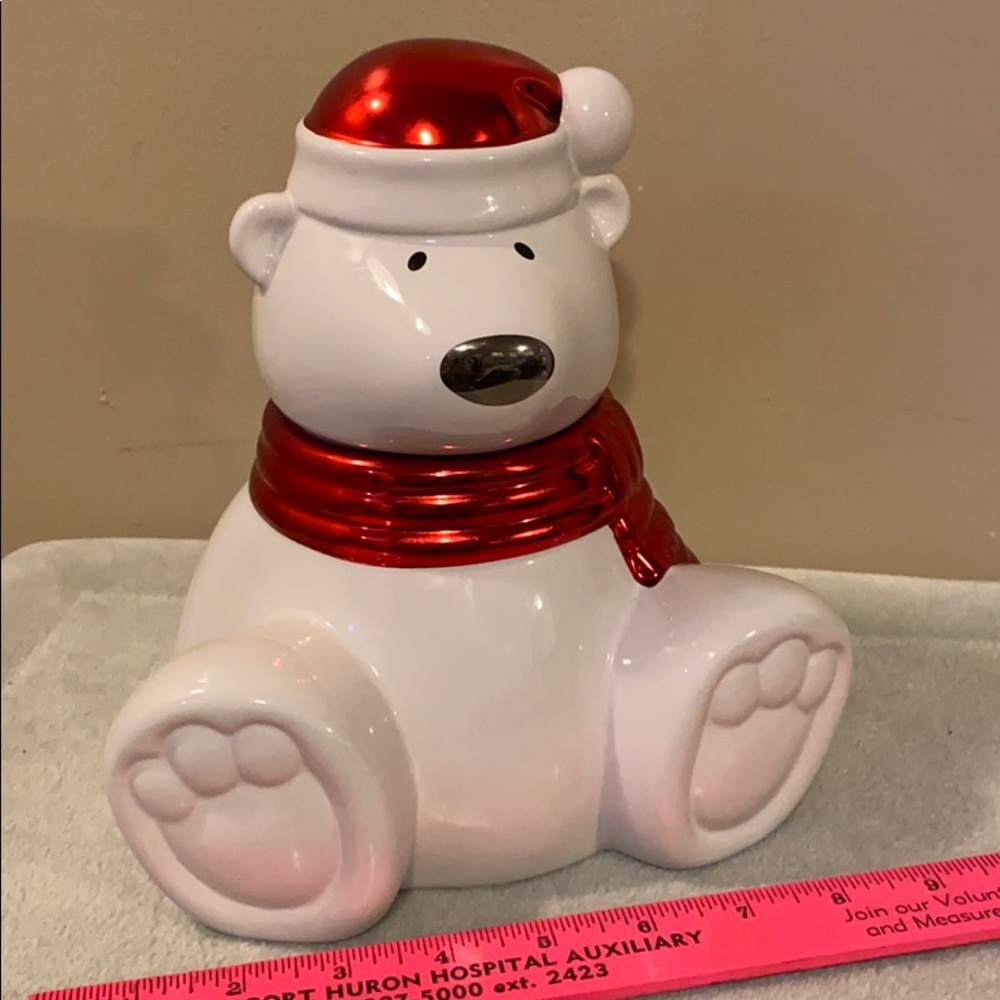 Bath and body works signed bear was a candle .